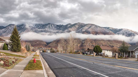 Weather Coming in on a Fall Morning, Town Near the Rocky Mountains, Road to the Wildernessの写真素材