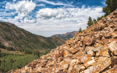 Nature Scenery with Gorgeous Views from Summit of Blue Skies and Untouched Western Wildernessの写真素材