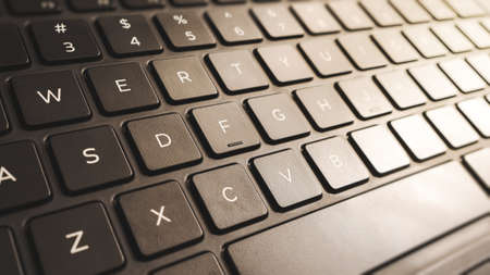 Detail of a Modern Laptop's Flat Keyboard, Necessary Part of Computer for Entering Input Information, Technology Accessoriesの写真素材