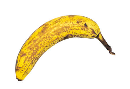 Old Unpeeled Banana Isolated on White Background, Ripe Tropical Fruit Ready to be Eatenの写真素材