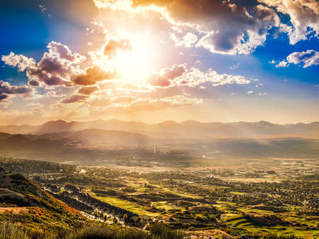 Breathtaking, Gorgeous Landscape of Sunset or Sunrise over a Mountain Valleyの写真素材
