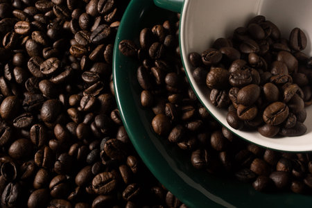 Coffe beans and cup. High resolution image.