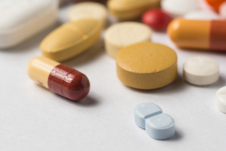 Multiple pills depicting medical treatment or pahrmaceutical industry. High resolution image.の写真素材