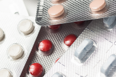 Multiple pills depicting medical treatment or pahrmaceutical industry. High resolution image.の写真素材