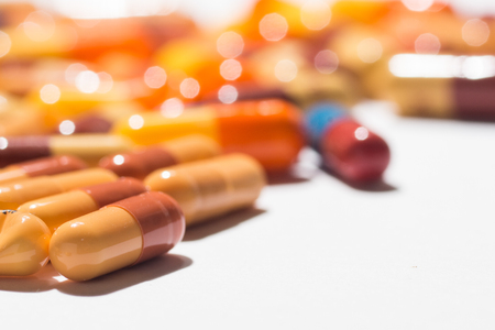 Multiple pills depicting medical treatment or pahrmaceutical industry. High resolution image.の写真素材