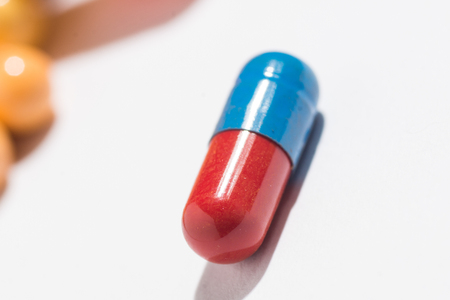 Multiple pills depicting medical treatment or pahrmaceutical industry. High resolution image.の写真素材