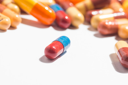 Multiple pills depicting medical treatment or pahrmaceutical industry. High resolution image.の写真素材