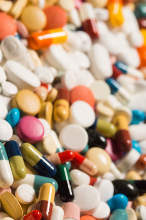 Multiple pills depicting medical treatment or pahrmaceutical industry. High resolution image.の写真素材