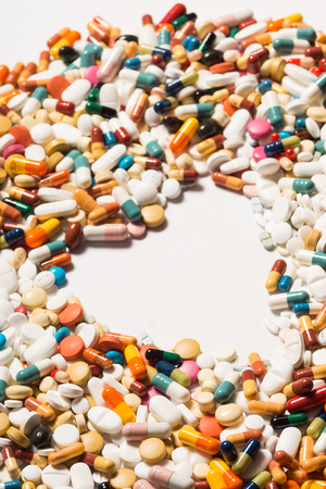 Multiple pills depicting medical treatment or pahrmaceutical industry. High resolution image.の写真素材