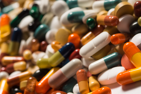 Multiple pills depicting medical treatment or pahrmaceutical industry. High resolution image.の写真素材