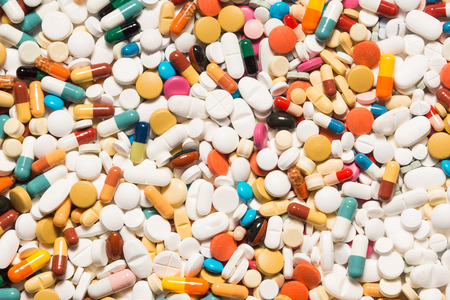 Multiple pills depicting medical treatment or pahrmaceutical industry. High resolution image.の写真素材