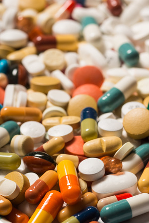 Multiple pills depicting medical treatment or pahrmaceutical industry. High resolution image.の写真素材