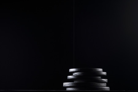 Bodybuilding weights concept on black background. High resolution image concept for bodybuiding or fitness industry.の写真素材