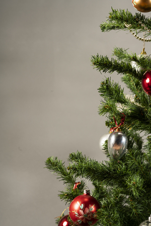 Christmas tree with presents underneath. High resolution image for Christmas Holliday.の写真素材