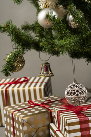 Christmas tree with presents underneath. High resolution image for Christmas Holliday.の写真素材