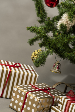 Christmas tree with presents underneath. High resolution image for Christmas Holliday.の写真素材