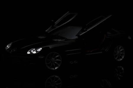 Black SLR McLaren on black background. High resolution image for automotive industry.のeditorial素材