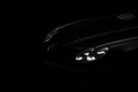 Black SLR McLaren on black background. High resolution image for automotive industry.のeditorial素材
