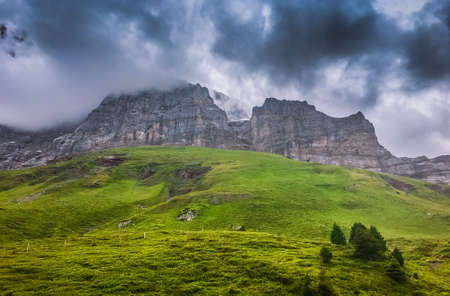 Landscape scenery view of a mountain under the cloudy skyの写真素材