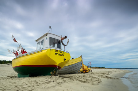 Boats in Piaski near Krynica Morska, Poland. Baltic Sea in the backgroundのeditorial素材