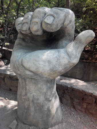 sculpture stone hands in parkの写真素材