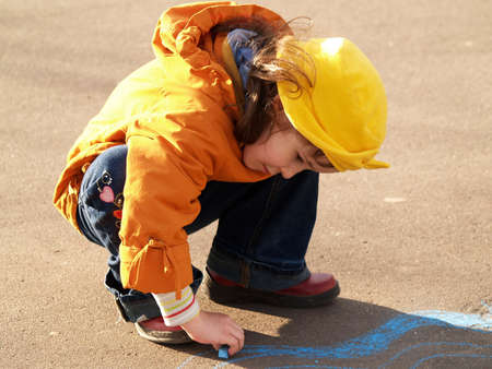 Orange painting girlの写真素材