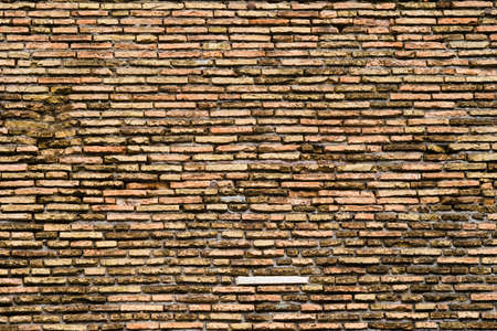Old colourful brick wall of building, texture and backgroundの写真素材