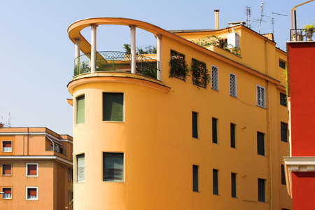 Interesting yellow modern building with columns in Romeの写真素材
