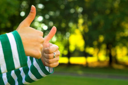 thumbs up sign, two handsの写真素材