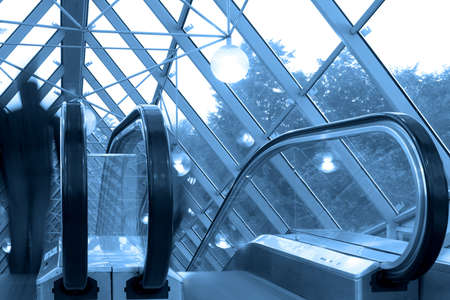 Mooving escalators and stairs, bridge with spheres