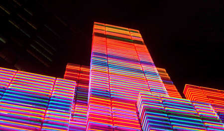 Neon color skyscrapers in nightの写真素材
