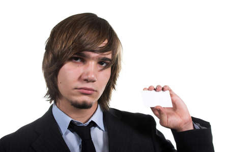 assured handsome guy in costume with blank cardの写真素材