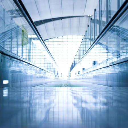 moving  escalator in the office hall perspective view