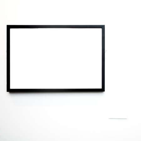 empty frame on white wall in museumの写真素材