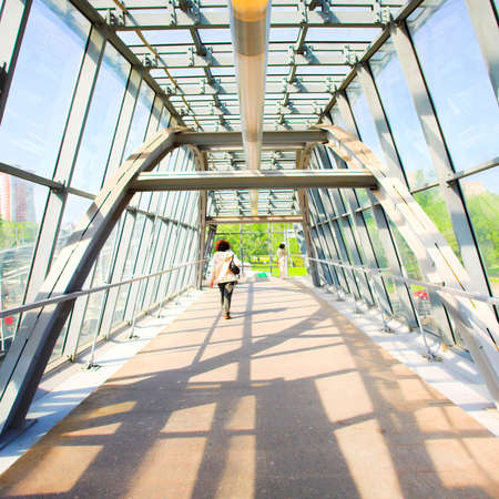 metal corridor, crowd moovingの写真素材