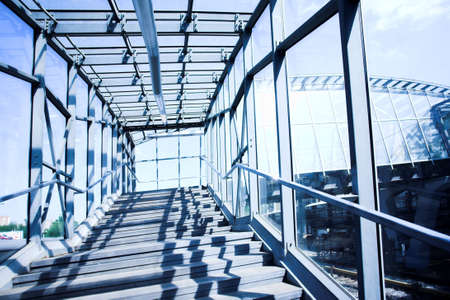 Blue metal corridor, crowd moovingの写真素材