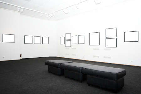 walls in museum with empty framesの写真素材