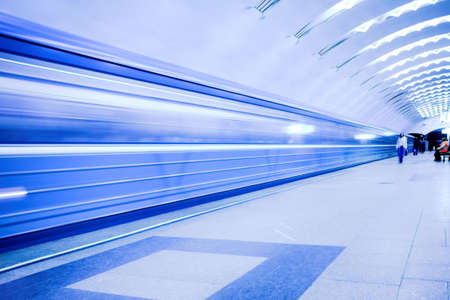 crowd waiting train on platform in subway