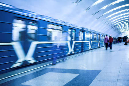 crowd waiting train on platform in subwayの写真素材