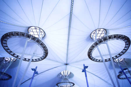 blue unusual geometric ceiling of office building 