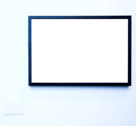 empty frame on blue wall in museumの写真素材
