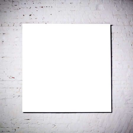 White frame on  white brick wall in museumの写真素材
