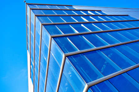 Modern blue office building cornerの写真素材