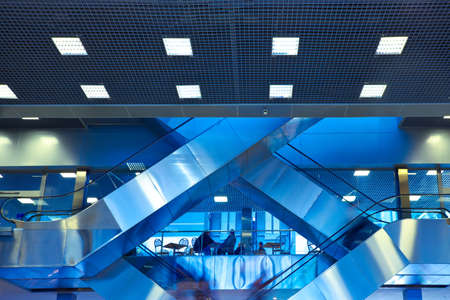 Diagonal escalators in office centerの写真素材