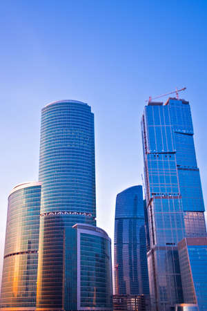 Blue modern skyscrapers in business centre in Moscow on sunset, Russiaの写真素材