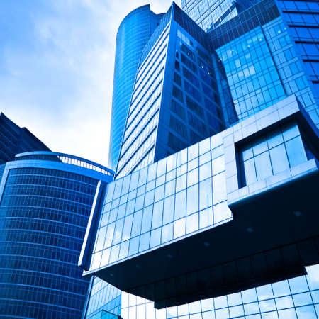 Crop of skyscrapers business center in blue