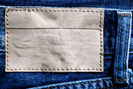 Denim background with blank labelの写真素材