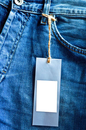 Blue jeans background crop with blank label の写真素材