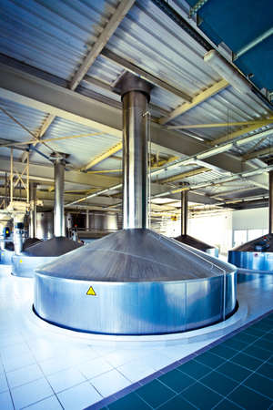 On the territory of brewer's plant with steel fermentation vatの写真素材