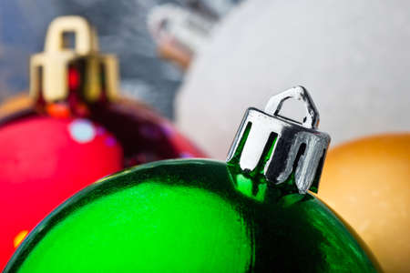 Green, red, white and gold christmas balls の写真素材